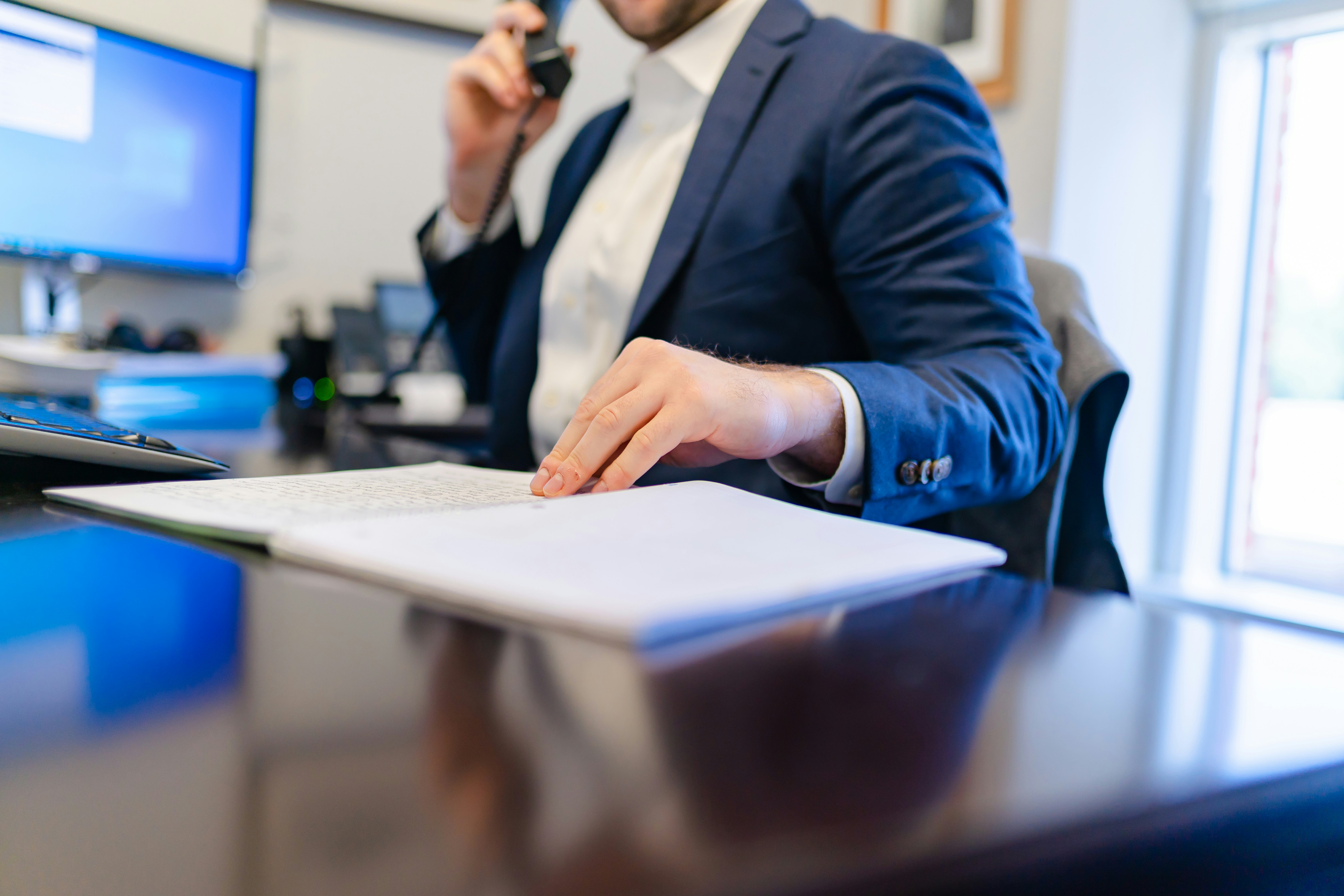 Visa specialist reviewing a client's application documents